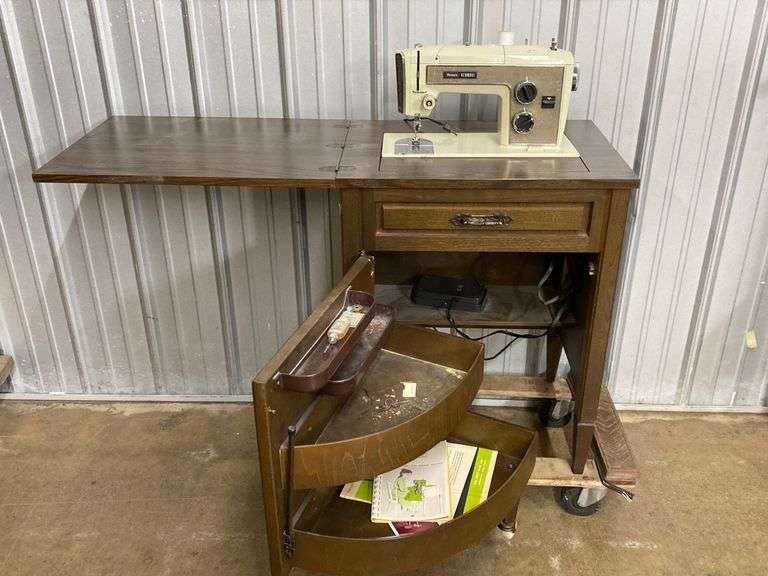 Vintage kenmore sewing machine in cabinet